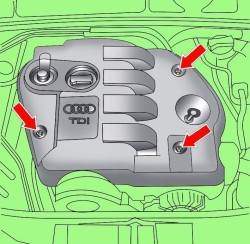 Расположение винтов крепления кожуха двигателя и указателя (1) уровня моторного масла