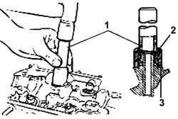 Использование приспособления 09222– 22001 (1) для установки маслосъемного колпачка (2) на направляющую клапана и седло (3) пружины клапана