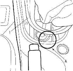 При установке нижней центральной части панели приборов (1) лапка передней панели должна войти в гнездо (A) центральной консоли
